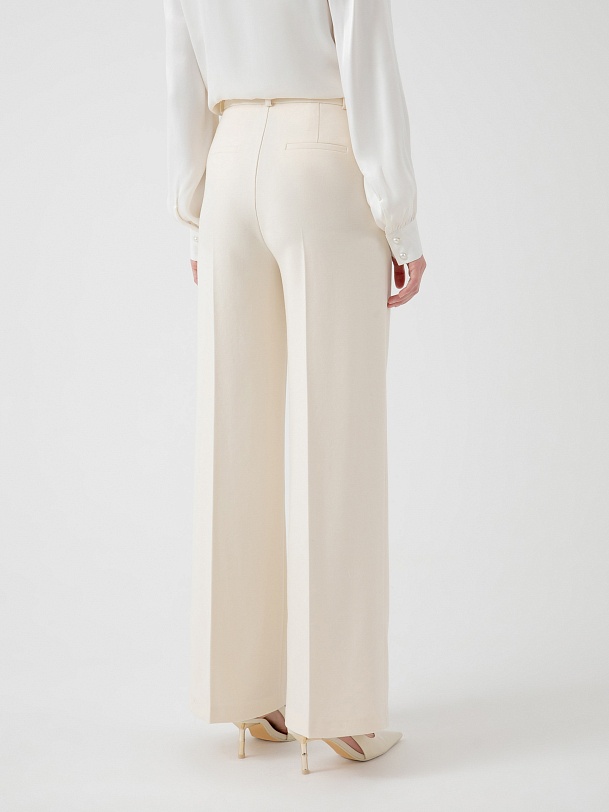 Элегантные брюки кремового цвета
