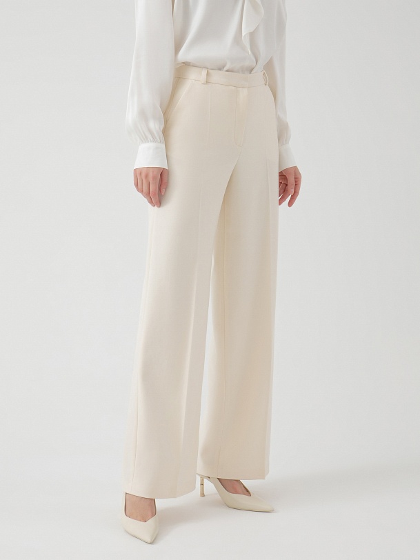 Элегантные брюки кремового цвета