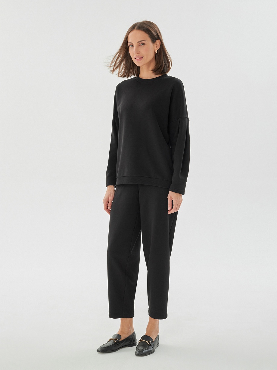 Свободные черные брюки из футера