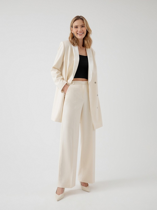 Элегантные брюки кремового цвета