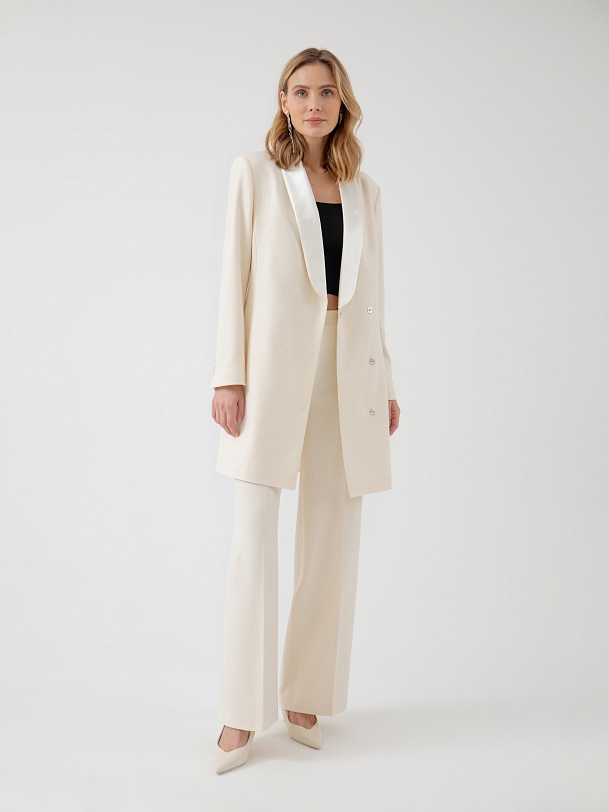 Элегантные брюки кремового цвета