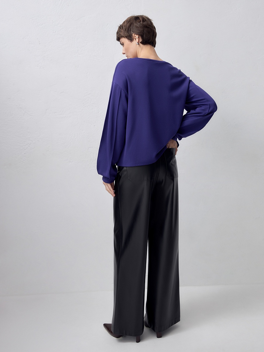 Широкие расклешенные брюки из черной экокожи