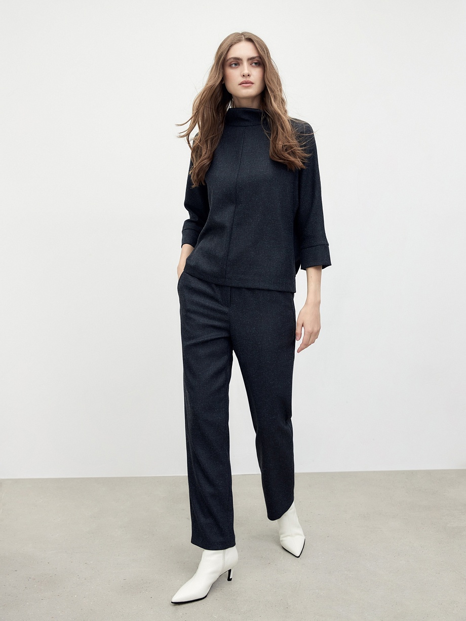 Широкие брюки на резинке с накладными карманами