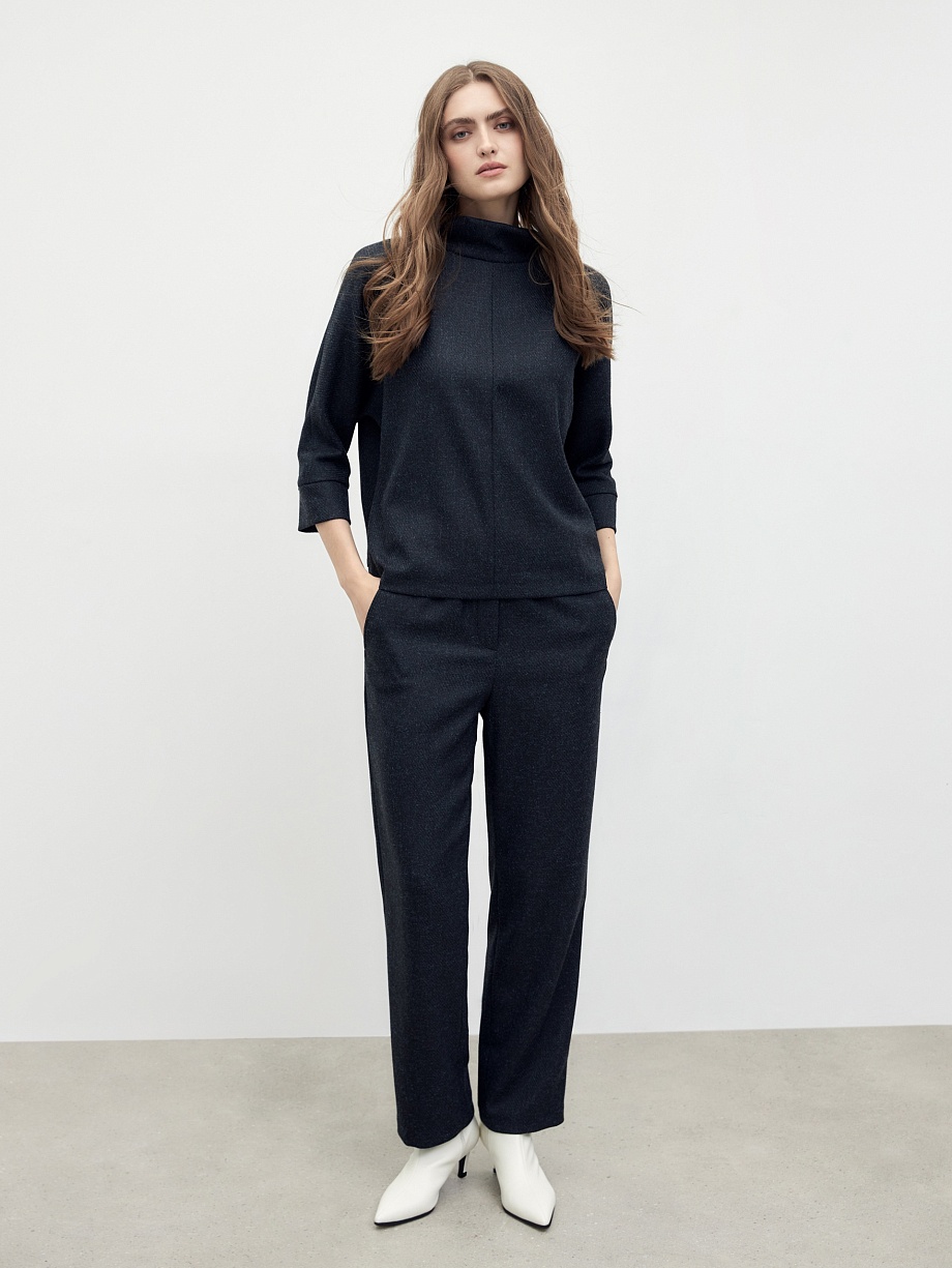 Широкие брюки на резинке с накладными карманами