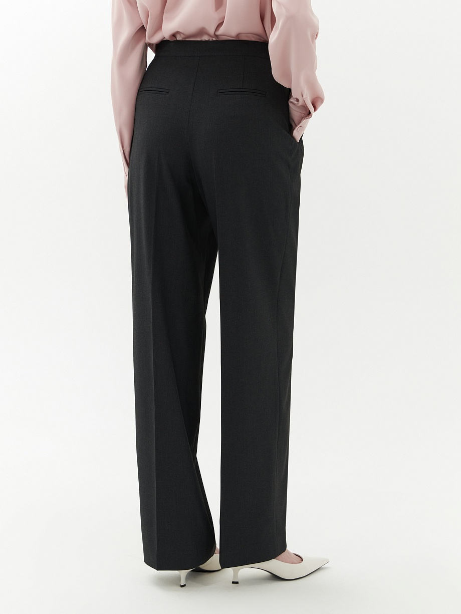 Широкие брюки с асимметричным гульфиком и складками