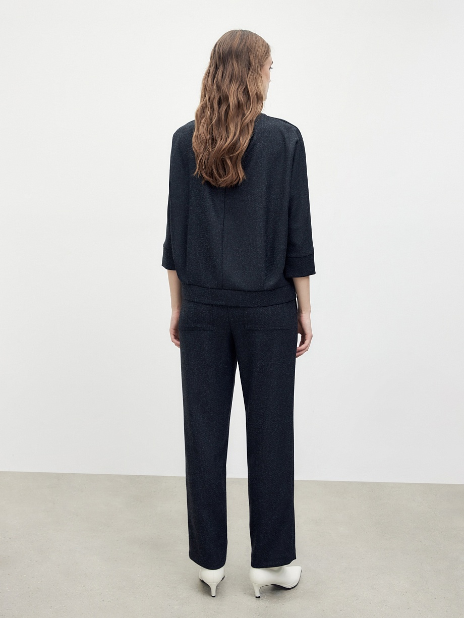 Широкие брюки на резинке с накладными карманами