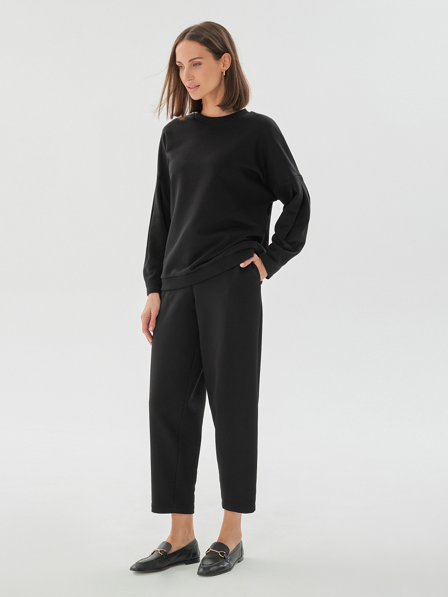 Свободные черные брюки из футера